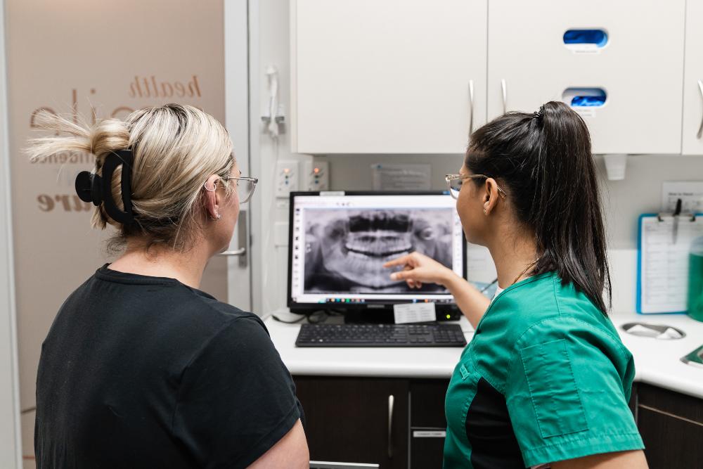dentist and patient at computer in reservoir vic